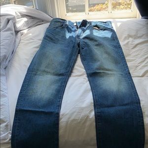 Semi faded blue jeans made by GAP